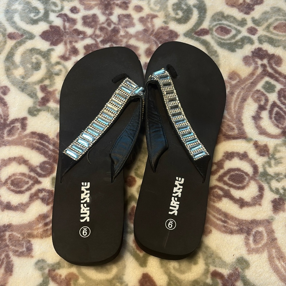 Black Surf style Sandals, have a 3 inch heel, never worn
